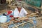 Phuket, Thailand: Fisherman Sewing Trap Netting