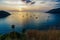 PHUKET,THAILAND - Naiharn bay with yatch boat at windmill viewpoint at sunset, Phuket Province Thailand