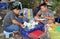 Phuket, Thailand: Two Men Eating Dinner