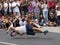 Physical performance of a breakdancer in the street.