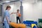 Physical therapist working with little girl in sensory room. Exercising for development of tactile sensations.