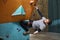 Physically handicapped sportsman starts climbing training in bouldering center