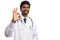 Physician holding fingers as okay sign
