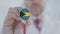 Physician uses stethoscope with the Bahamian flag. Healthcare in the Bahamas