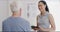 Physiotherapist consultation, tablet and happy people talk about client answer, digital survey or chiropractic services