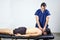 Physiotherapist doing a mobilization neck of female patient. Manual therapy. Neurological physical examination. Osteopathy,