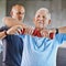 Physiotherapist man, senior patient and weight training for health and wellness therapy in retirement. Healthcare