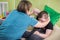 Physiotherapy with a child having a cerebral palsy. Fine motor skills developmenting.