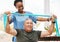 Physiotherapy support, stretching band and nurse with senior man for physical therapy, rehabilitation and healthcare