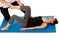 Physiotherapy - therapist doing leg stretching excercises with