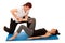 Physiotherapy - therapist doing leg stretching excercises with