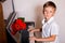 Pianist boy with a bouquet of flowers