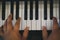 pianist man& x27;s hand playing piano. performer & classic music inst