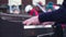 Pianist in the mask plays the piano on the street