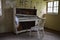 Piano in an abandoned night club