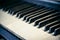 Piano keyboard with selective focus. Side view of piano keys. Conservatory Philharmonic music craft