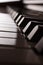 Piano keyboard side view - sepia