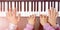 Piano Keyboard top View and Hands of Child Mother and Father