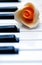 Piano keys with flower