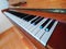 piano made of noble brown wood