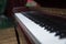 Piano presses . Piano keys close up. Musical instrument . Select focus and soft focus.Close-up of a wooden piano . Defocused