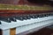 Piano presses . Piano keys close up. Musical instrument . Select focus and soft focus.Close-up of a wooden piano . Defocused