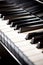 piano\\\'s keys in close-up detail, revealing the black and white keys, instrument\\\'s music.