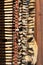 piano tuning pegs and hammers in bright sunshine. Inside parts of wooden musical instrument. Vintage harpsichord detail