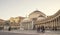 Piazza del Plebiscito with tourists visiting famous monument San Francesco di Paola Naples,