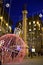 Piazza della Santa Trinita in Florence, in the evening, with a large ball of lights in the foreground, is the backdrop for the alm