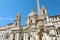 Piazza Navona square with Sant Agnese church and fountain with Egyptian obelisk, Rome, Italy