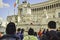 Piazza Venezia, Rome, Italy. Group of tourists walking on the street to go to a famous landmark