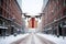 Pic Drone delivers order, gift, cardboard box, snowy city streets