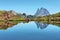 Pic du Midi d Ossau reflecting in Anayet lake, Spanish Pyrenees, Aragon, Spain