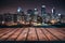 Pic Empty wooden tabletop over city night view background