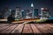 Pic Empty wooden tabletop over city night view background