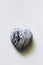 Picasso jasper stone heart on a white background