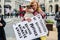 PICCADILLY CIRCUS, LONDON, ENGLAND- 1 May 2021: XR protester hugging a friend after blocking a road as part of â€˜Rebellion of One