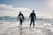 Pick a coast and grab your board. a young couple out surfing together at the beach.