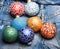 Pick colorful decorations. Modern christmas decor. Christmas ornaments or decorations on denim pants background. Balls