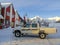 Pick up truck cars, buildings tourism in winter, Balestrand, Norway