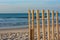 Picket fence on the shore, beach style.