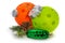 Pickleball Christmas decoration.  Orange and Green Pickleballs dressed for the tree. Add a Pickle Please.