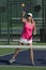 Pickleball - Female Hitting Ball At Net