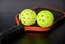 Pickleball paddles and pickleballs