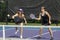 Pickleball Players Net Action