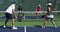 Pickleball - Two Couples Congratulating Each Other After A Game Well Played