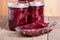 Pickled beets in jars and bowl