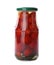 Pickled cherry tomatoes in glass jar isolated
