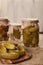 Pickled cucumbers in glass jars traditional salted homemade marinated vegetables